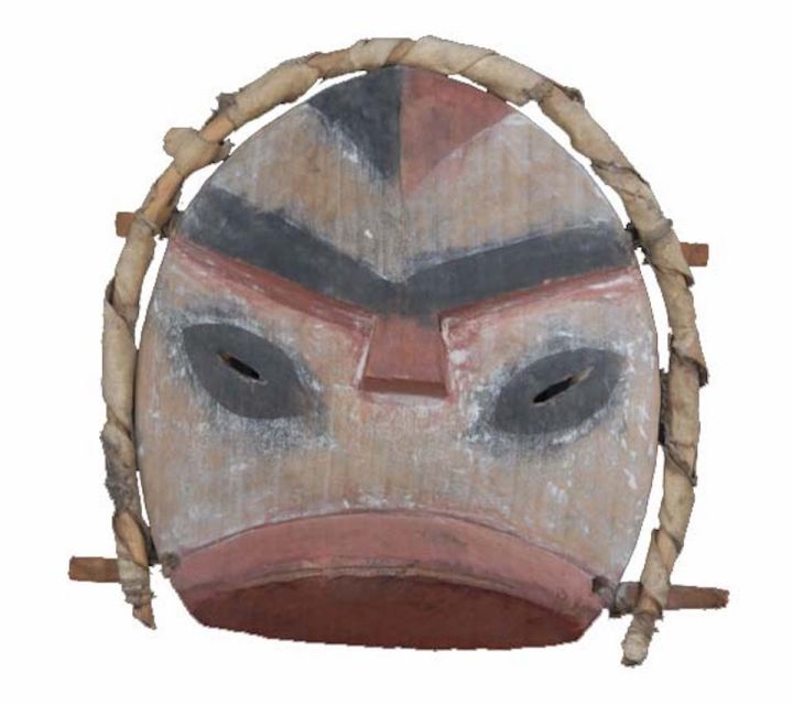 A small wooden mask with a hoop around it.