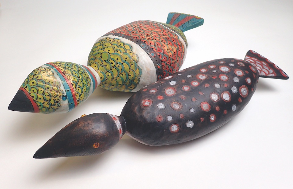 two small carvings of ducks.